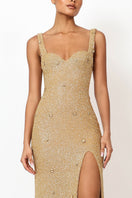 Kroon gold gown by Khanum's featuring elegant fabric and intricate design, perfect for formal occasions.