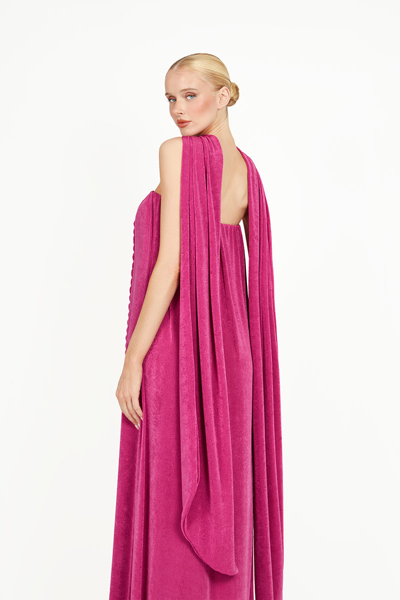 Pink Kushmita maxi dress by Khanum's featuring a flowing fabric and elegant design, displayed on a hanger.