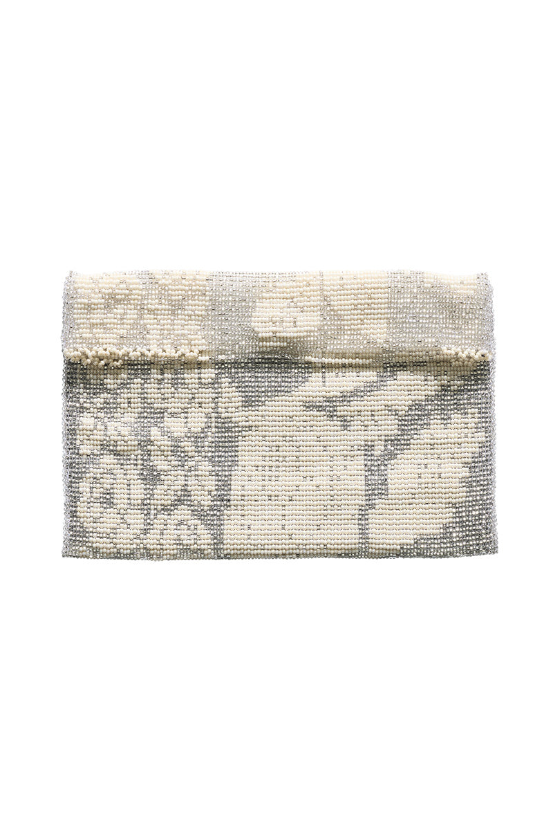 Silver lace clutch by Pura Utz featuring intricate lace detailing and a sleek, elegant design for evening occasions.
