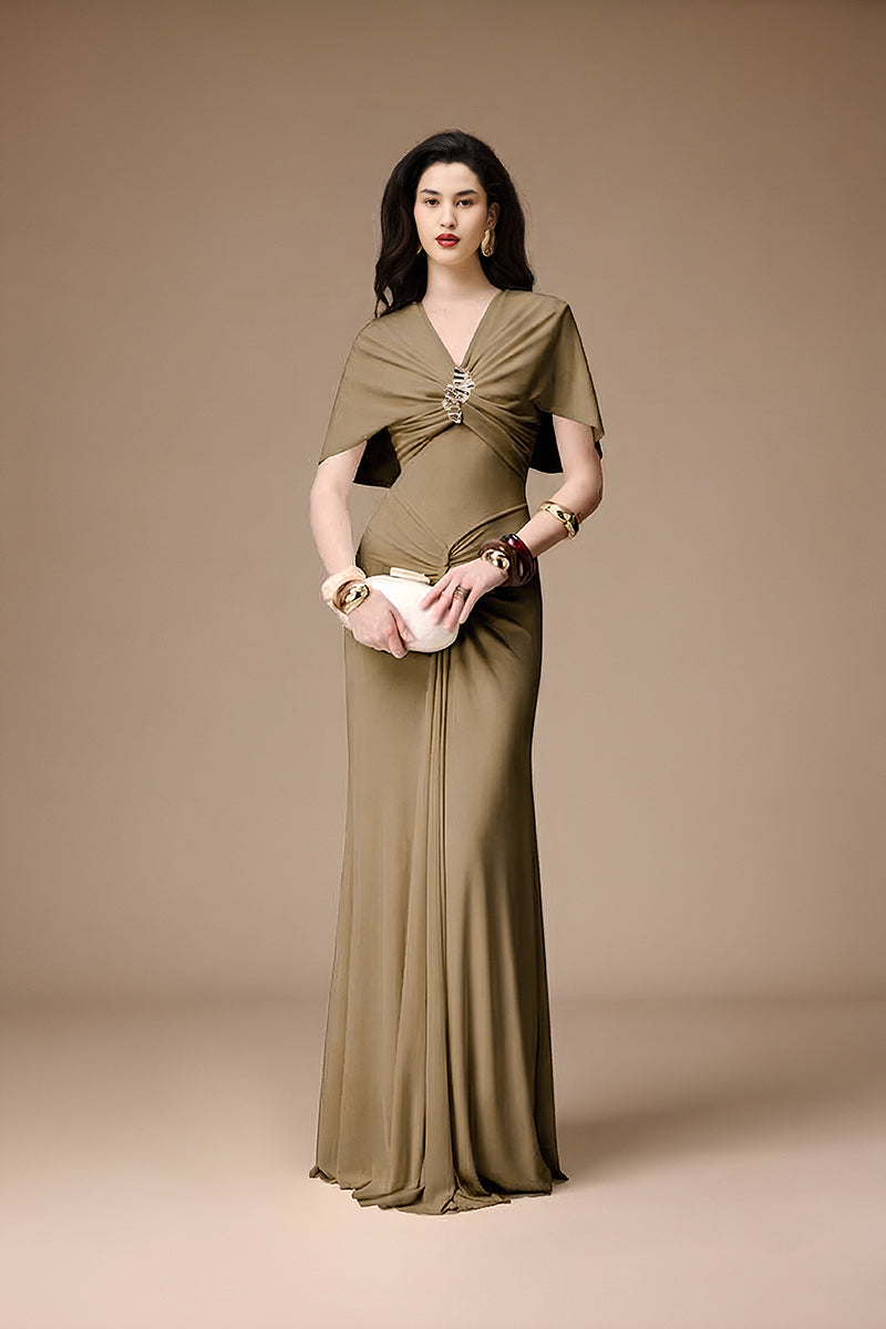 Elegant khaki gown by Jenny K Tran featuring a flowing silhouette and intricate detailing, perfect for formal occasions.