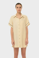 NiLuu AQUAFLORA Logan button-down shirt in cream, showing a close-up of the elegant collar and fabric texture.
