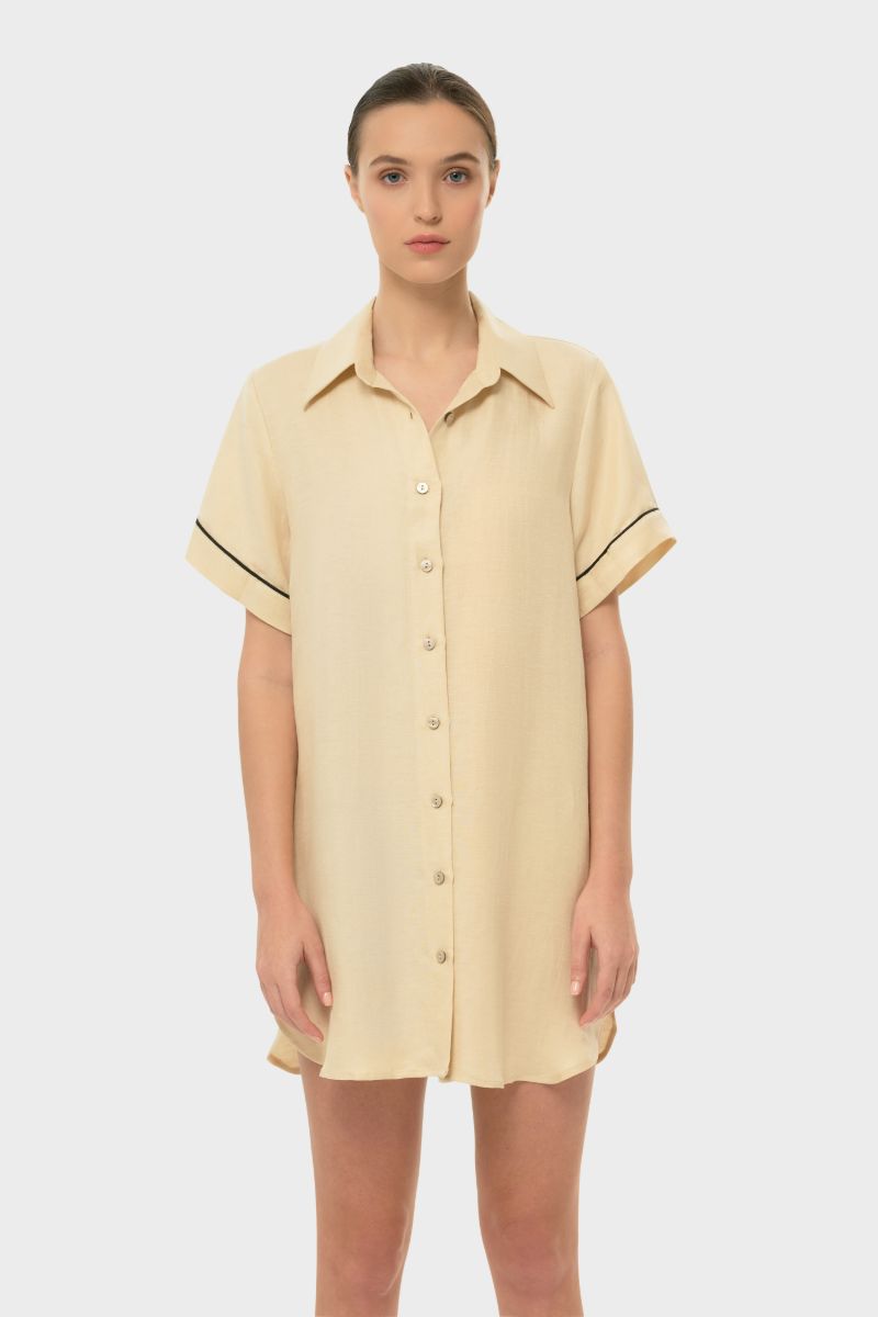 NiLuu AQUAFLORA Logan button-down shirt in cream, showing a close-up of the elegant collar and fabric texture.