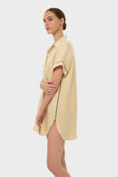 niLuu AQUAFLORA Logan button-down shirt in creme, lightweight top with classic collar and long sleeves, shown on a hanger.