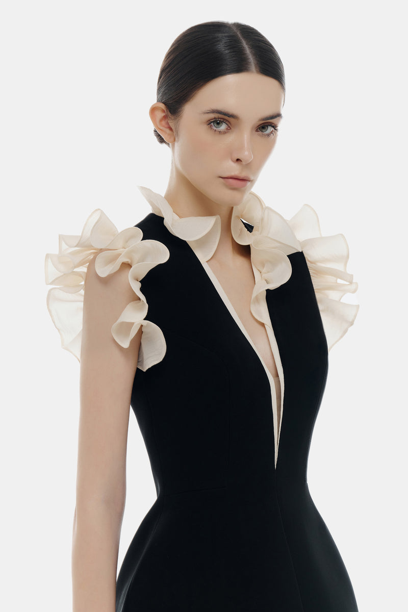 Black ruffle V-neck mini dress by Montsand featuring a stylish V neckline and ruffle details, perfect for casual or semi-formal occasions.