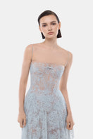 Blue straight neckline pleat gown by Montsand, flowing fabric with elegant pleats and a sleek silhouette.
