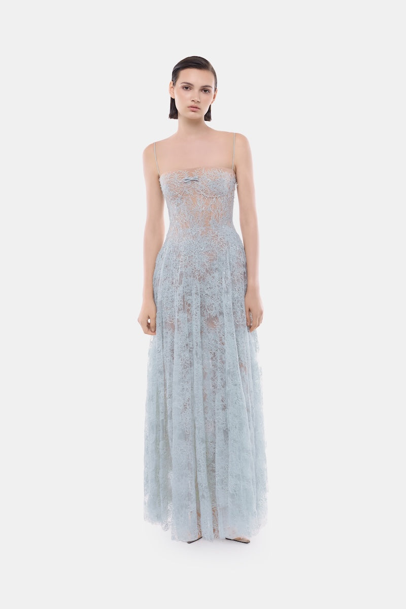 Blue straight-neckline pleated gown by Montsand, featuring elegant flowy fabric and a classic silhouette for formal occasions.