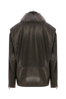 Tagg leather barn jacket with detachable fur collar, featuring rugged style and durable craftsmanship in a close-up view.