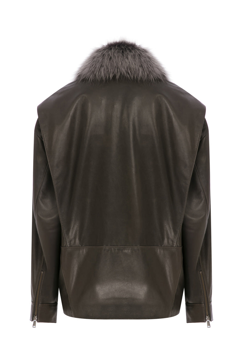 Tagg leather barn jacket with detachable fur collar, featuring rugged style and durable craftsmanship in a close-up view.