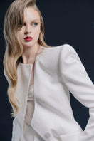 White Montpellier jacket by Lekieu, stylish outerwear with a tailored fit, featuring a smooth fabric and modern design.