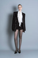 Black LEKIEU Grenoble jacket with a sleek design, featuring a fitted silhouette and zipper details.