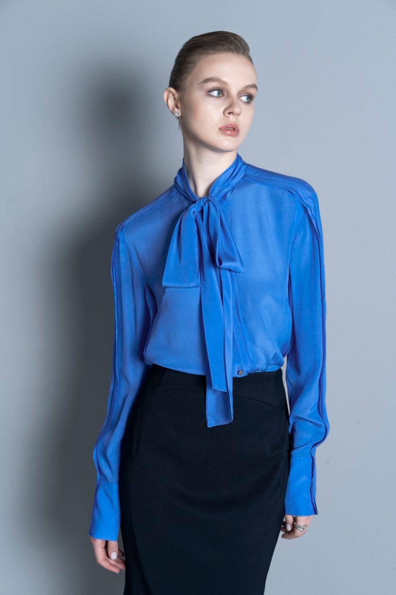 Blue Toulouse shirt by Lekieu, featuring a stylish collar and button-down design, displayed on a hanger.