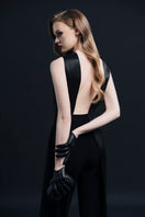 LEKIEU ELYSÉES black jumpsuit with stylish fit, featuring long sleeves and a tailored silhouette for modern elegance.