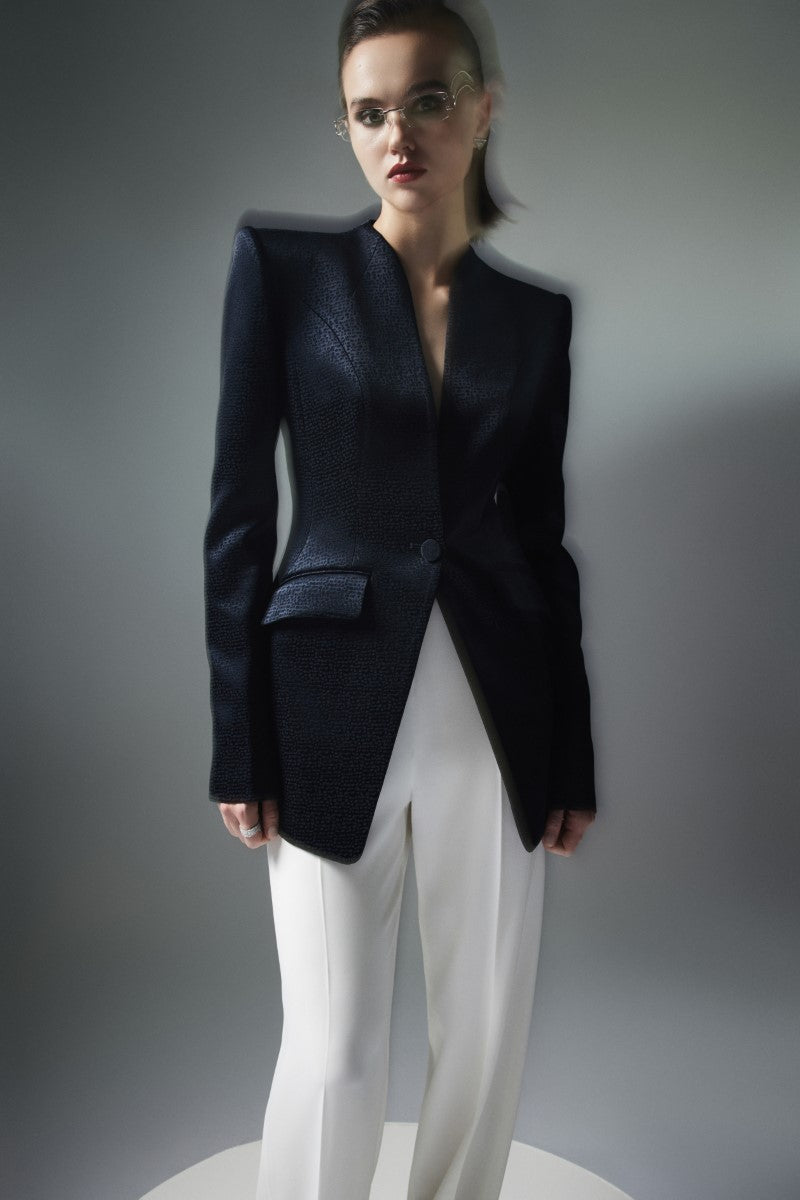 Black Lekieu Badajoz jacket displayed with front view, featuring a sleek design and tailored fit for stylish outdoor wear.