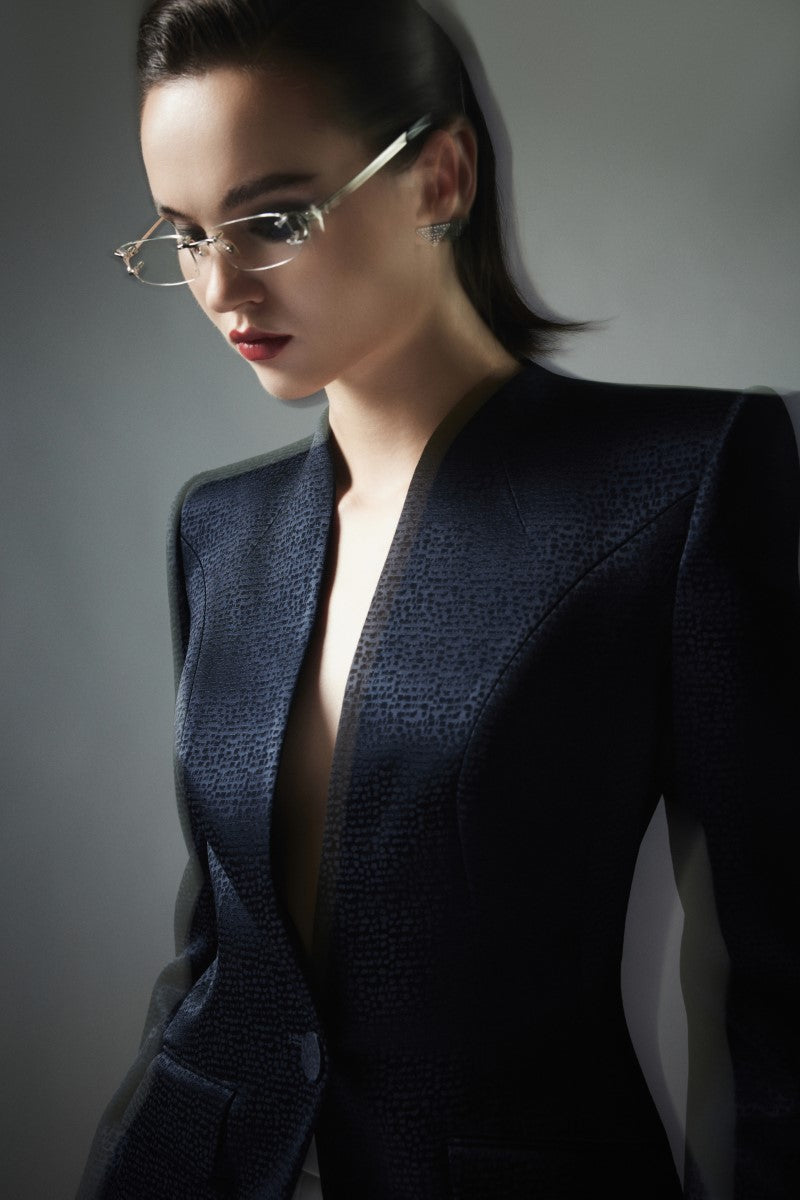 Black Badajoz jacket by Lekieu, featuring a stylish design with a zipper closure and tailored fit, displayed on a hanger.