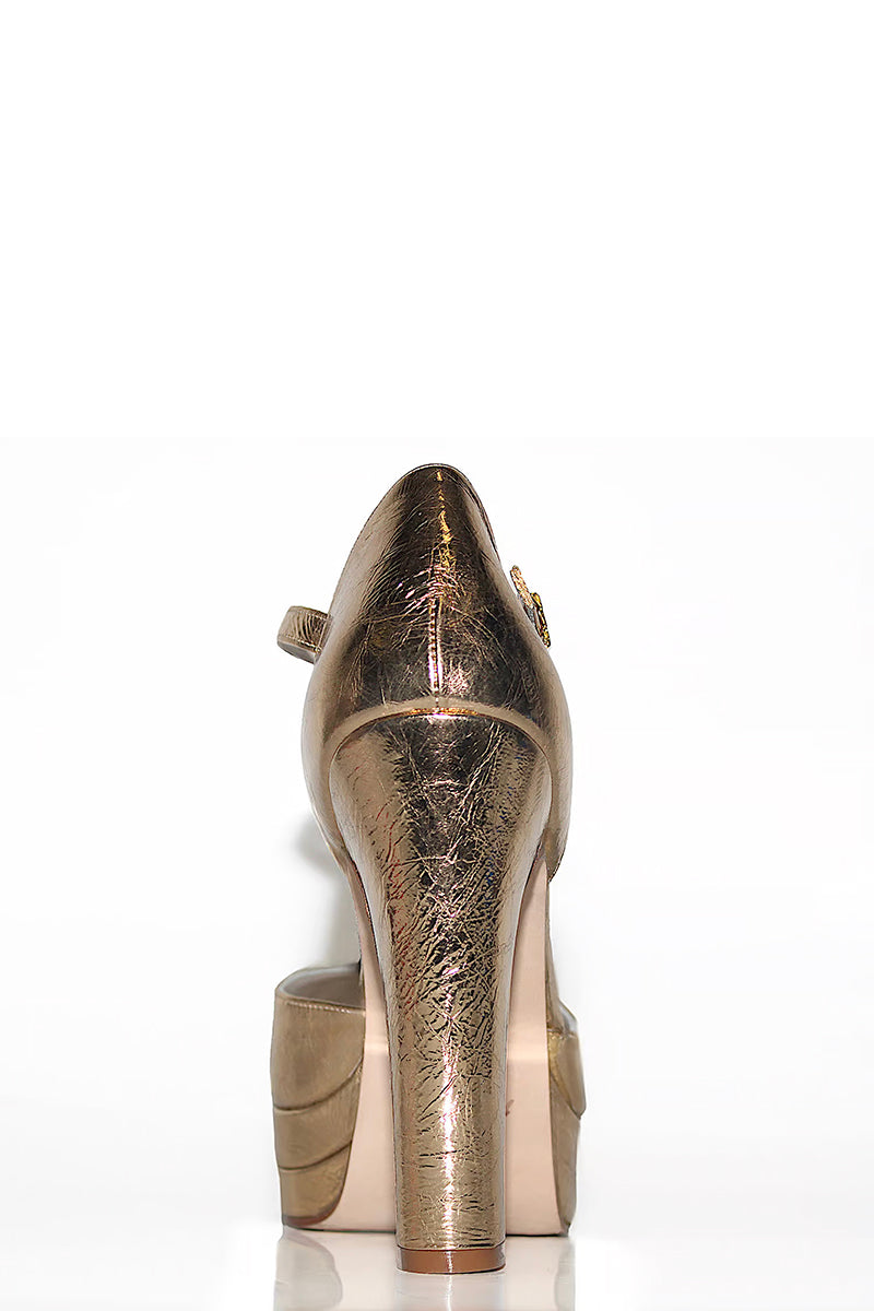 Gold Terry de Havilland Lena heels featuring stylish strappy design and high stiletto heel on a neutral background.