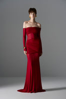 Le Thanh Hoa Crimson Aphrodite gown featuring elegant red fabric and intricate design, perfect for formal occasions.