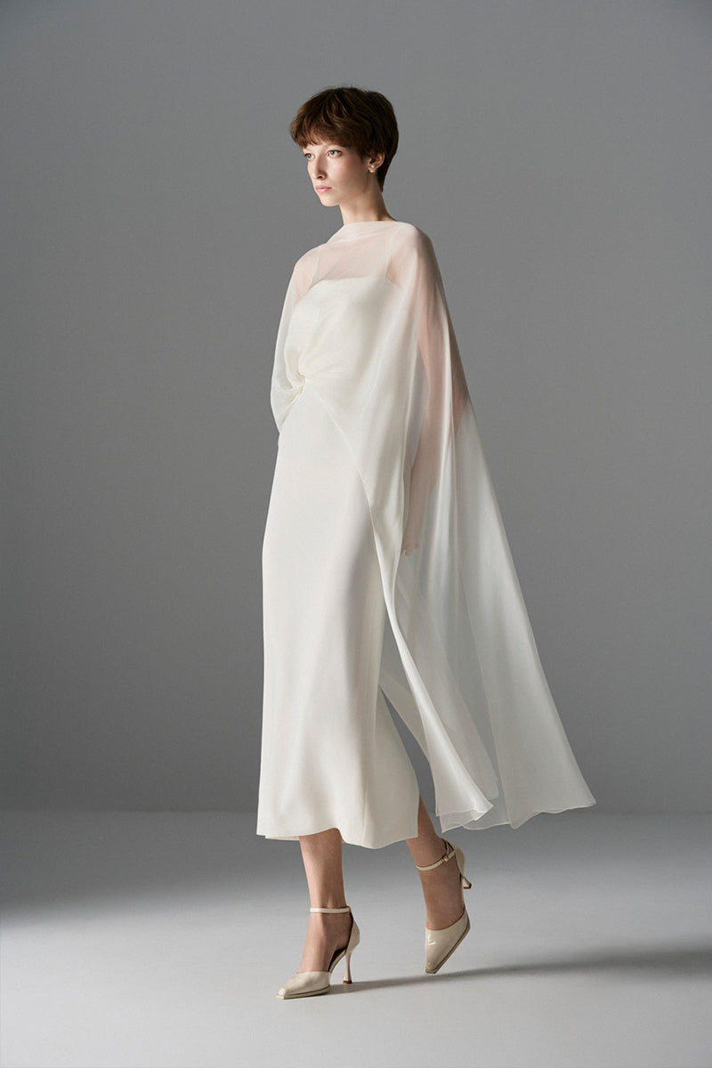Le Thanh Hoa Cloud Whisper Gown, elegant midi dress with flowing fabric and soft pastel colors, perfect for special occasions.