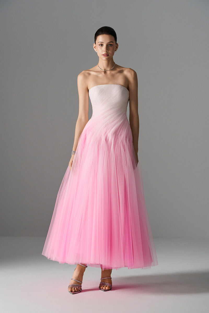 Le Thanh Hoa ombré sorbet gown featuring flowing fabric and elegant design, perfect for formal occasions.