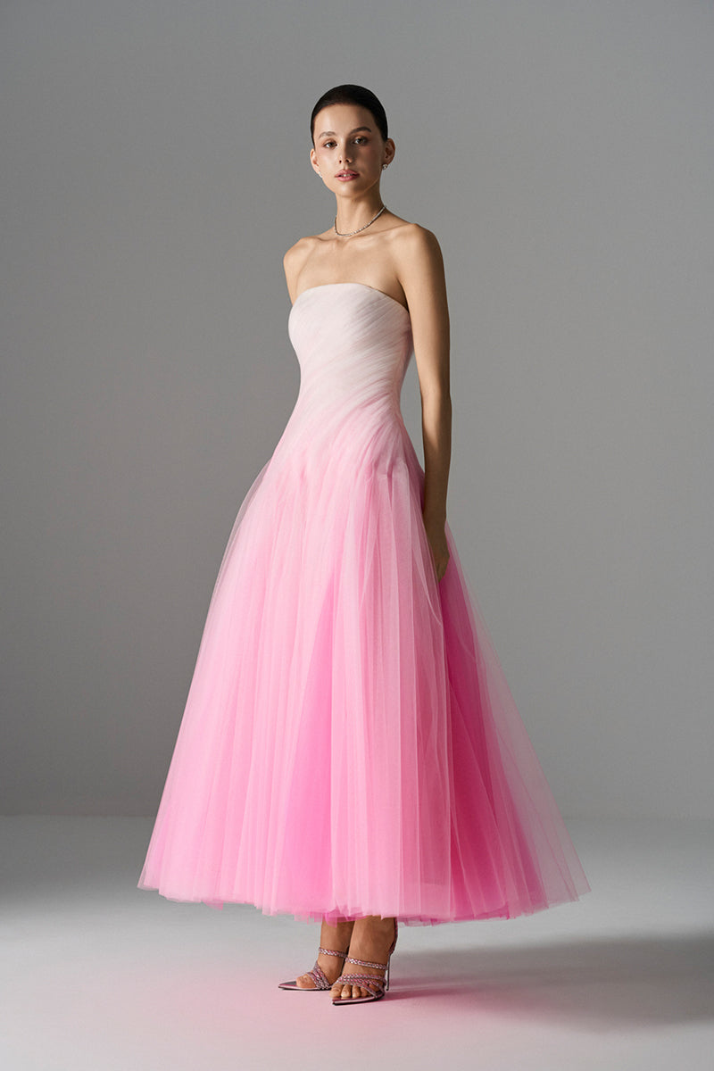 Le Thanh Hoa ombré sorbet gown featuring flowing fabric and elegant design, perfect for formal occasions.