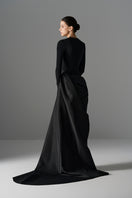 Le Thanh Hoa Serpentine Chic Gown featuring elegant flowing fabric and intricate design, perfect for formal occasions.
