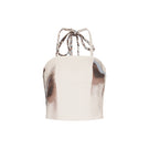 TINTA LATINA ivory top with a stylish design, featuring a fitted silhouette and elegant neckline, shown on a model.