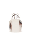 TINTA LATINA ivory top with a stylish design, featuring a fitted silhouette and elegant neckline, shown on a model.