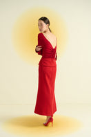 Red spandex midi skirt by EEGEN STUDIO, close-up of fitted waist and smooth fabric, stylish and versatile for various outfits.