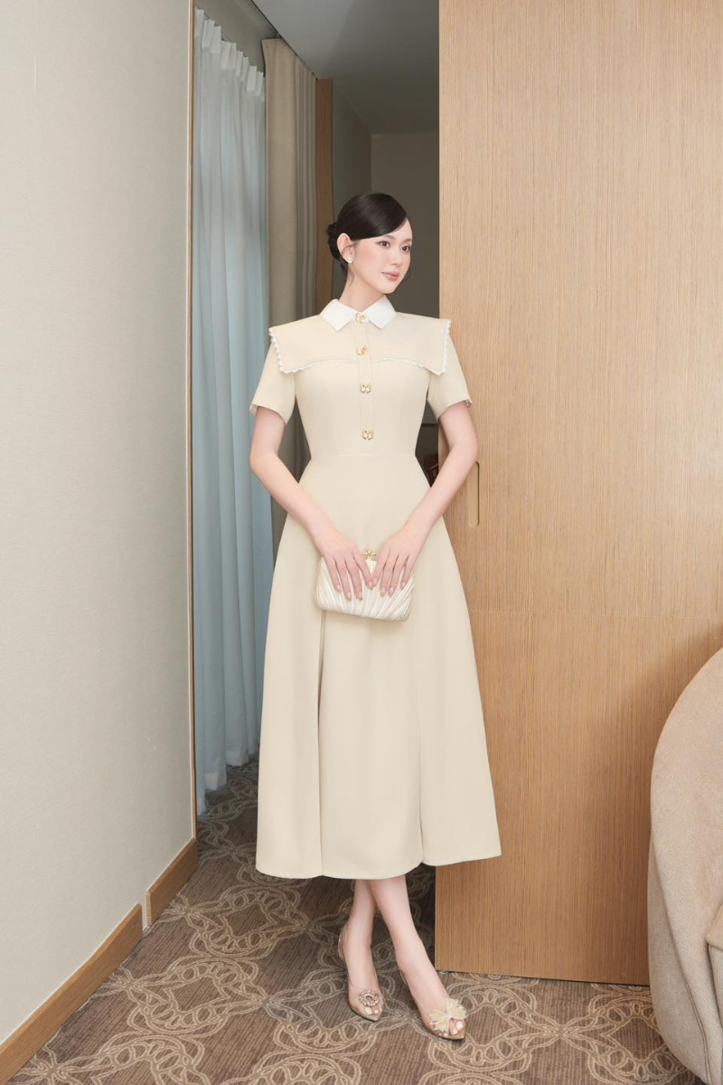 White Plan Liberty Dress midi dress with a flowing fabric and elegant design, perfect for casual and semi-formal wear.
