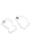 Silver glass hoop earrings by MAZ Manuela Álvarez with lichen-inspired design, showcasing elegant craftsmanship and reflective surface.