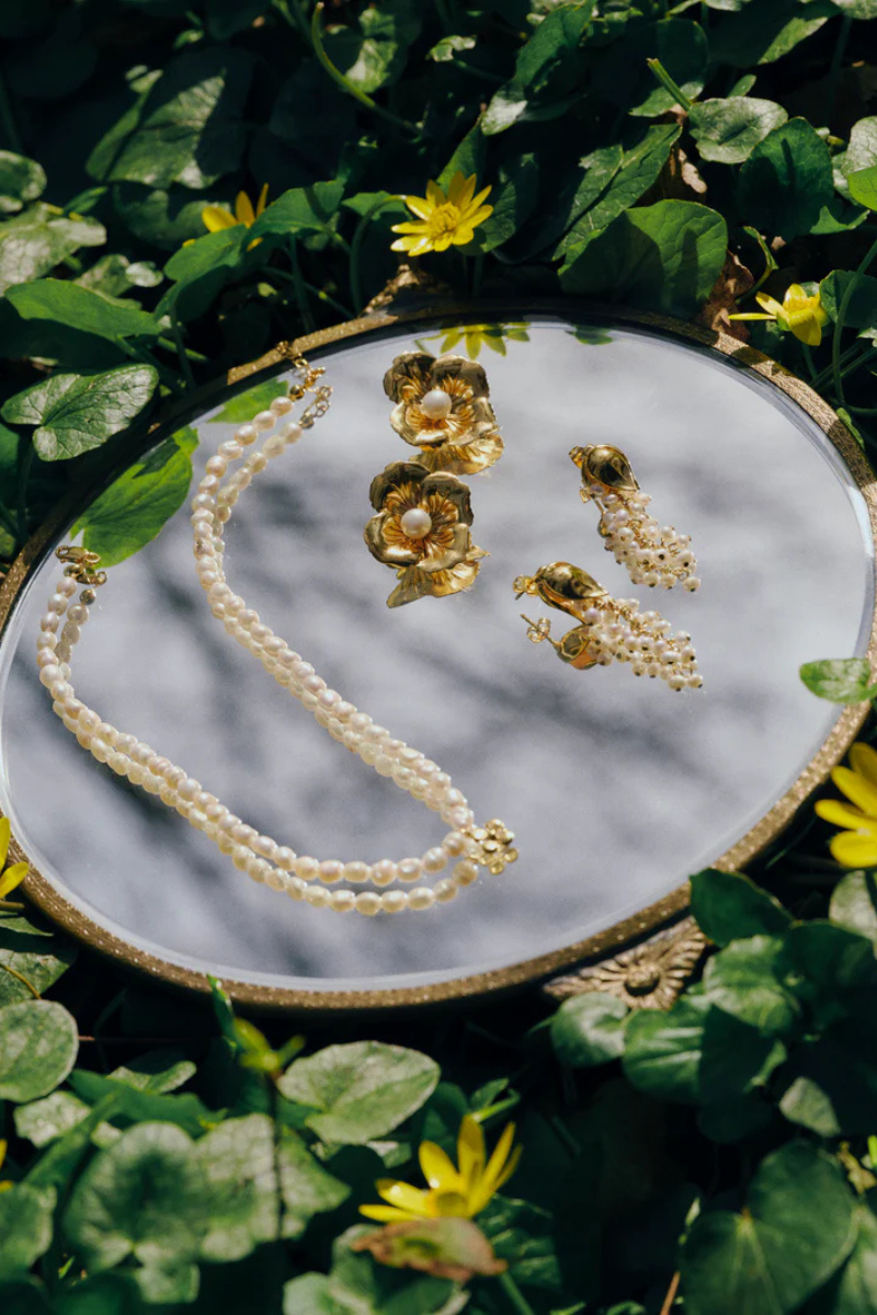 Peracas Lily of the Valley earrings featuring delicate ivory floral design, elegant jewelry for special occasions.