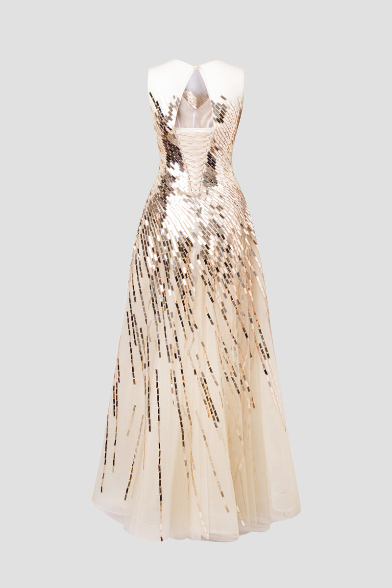 Aurelia radiant sequined strapless gown in champagne gold by HACCHIC COUTURE, featuring a fitted bodice and flowing skirt.