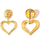 Gold lion with heart earrings by Natia x Lako, featuring detailed lion and heart-shaped design on silver hoops.