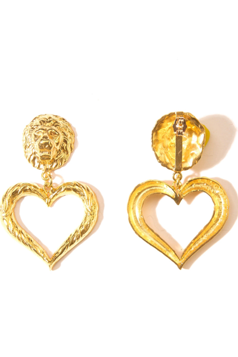 Gold lion and heart earrings by Natia x Lako featuring intricate lion and heart-shaped charms on hoops.