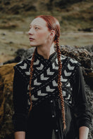 Maz Manuela Álvarez Loom Petal Crossed Top, stylish women's top with petal design and crossed details, shown on a model.
