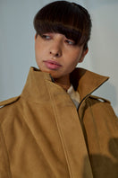 Lorena Saravia Katy suede jacket in tan, stylish and fitted, shown on a model with a tailored collar and long sleeves.