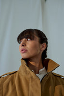 Brown suede Katy Jacket by Lorena Saravia with a tailored fit and stylish collar, shown on a model.