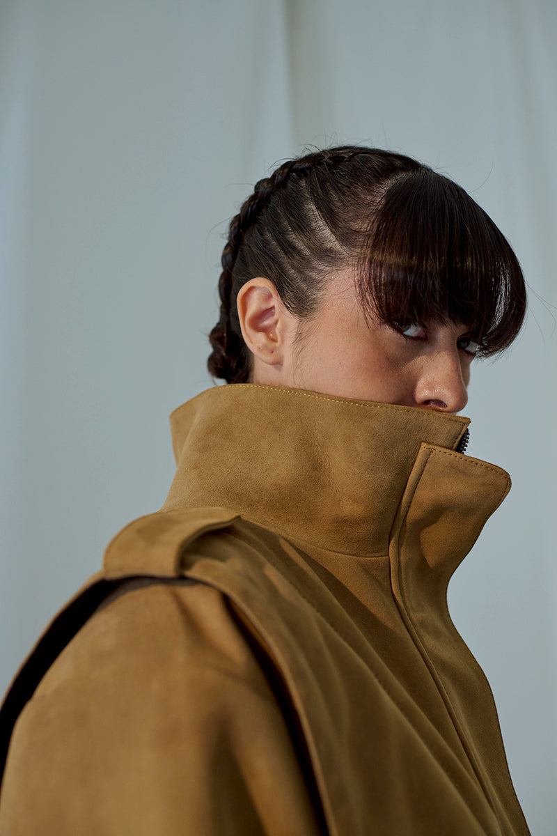 Suede Katy jacket by Lorena Saravia featuring a stylish design, shown on a model with a neutral background.