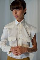 Lorena Saravia Isabela blouse, stylish shirt with elegant design, shown in a close-up view highlighting fabric and details.