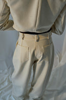 Lorena Saravia Alex wool pants in a tailored fit, showcasing the fabric texture and classic design for a sophisticated look.