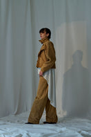Lorena Saravia Julia suede jacket shown in a stylish, beige suede jacket with a fitted design and classic collar.