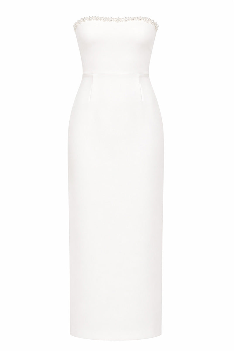 White LOTTE dress gown by Gigii's featuring elegant fabric and a flattering silhouette, displayed on a hanger.