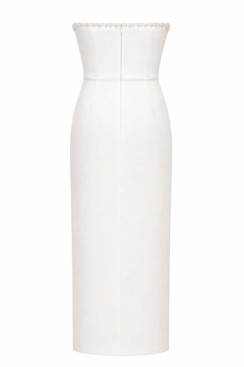 White LOTTE gown by Gigii's, elegant floor-length dress with a flowing design, perfect for formal occasions.