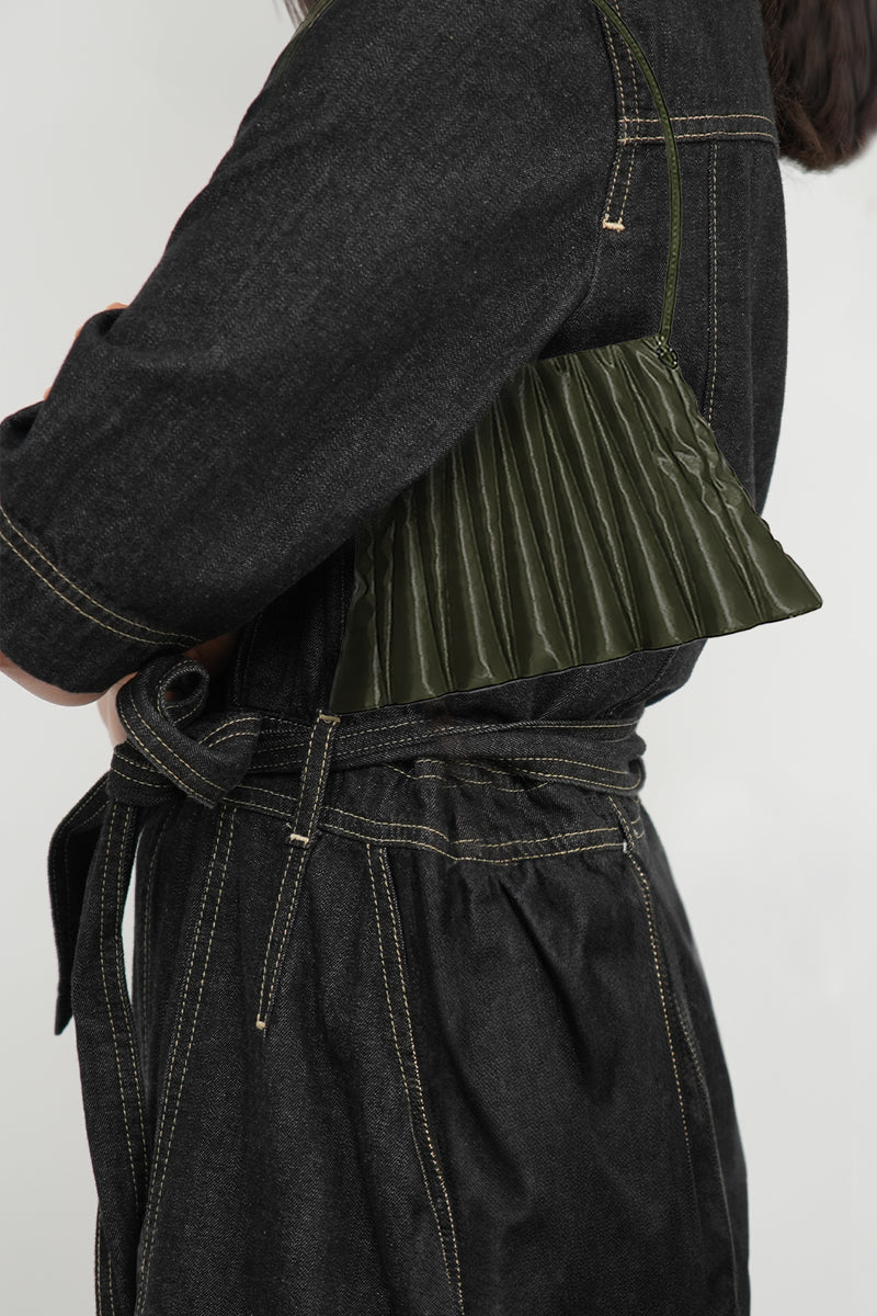 Touchless Olive Liquid Treasure shoulder bag with sleek design and silver hardware, stylish for casual or evening wear.