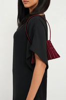 Touchless Plum Liquid Treasure shoulder bag with sleek design, featuring adjustable strap and stylish exterior in a modern shoulder bag style.