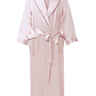 Pink silk long women's robe by MANITO, featuring smooth fabric and elegant design, displayed hanging on a wooden hanger.