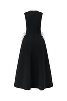Black sleeveless poly crepe midi flared dress by L'SCARLETT, showcasing a fitted bodice and flowing, flared skirt.