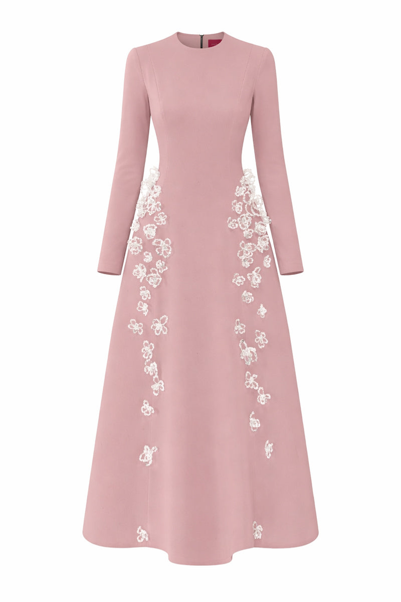 Light pink L'SCARLETT flared long-sleeve 3D crystal floral maxi dress shown from the front. Elegant and flowing design.