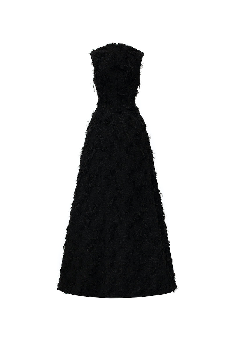 Black sleeveless fringe jacquard V-neck flared gown by L'SCARLETT, showcasing intricate pattern and flowing silhouette.