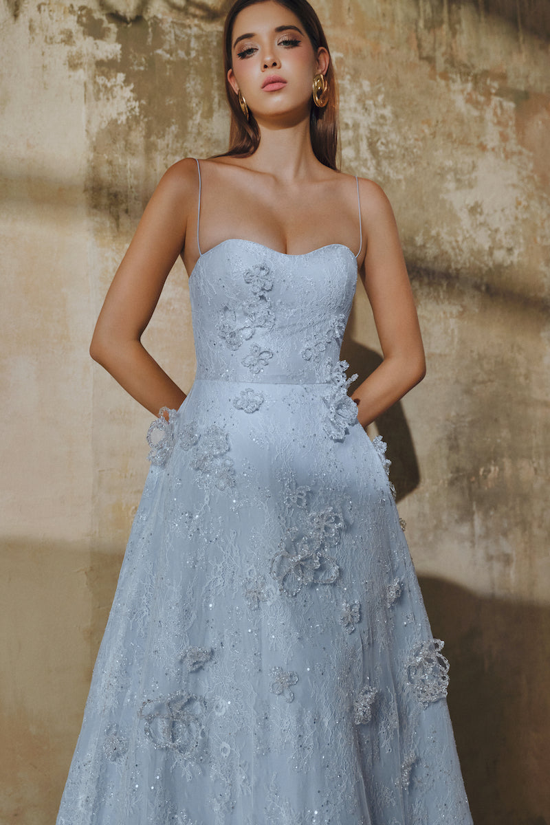 Blue L'Scarlett A-line spaghetti straps glitter lace maxi dress, featuring a flowing silhouette and elegant design.