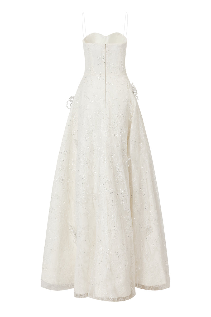 White L'SCARLETT A-line spaghetti straps glitter lace maxi dress shown from the back, featuring a flowing silhouette and elegant design.